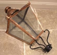 A Victorian copper framed street lantern, of typical square section tapering form, with a domed