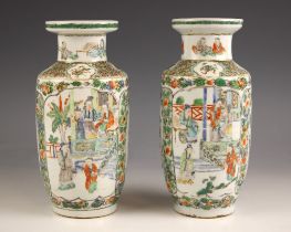 A pair of Chinese Canton famille verte vases, 19th century, each of rouleau form and decorated