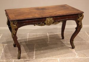 A French Louis XV style rosewood hall or side table, early 20th century, the quarter veneered and