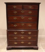 A George III mahogany chest on chest, the moulded cornice over two short and three long cock-