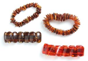 A group of four 'amber' bracelets, to include a fragmented examples of non uniform design, a further