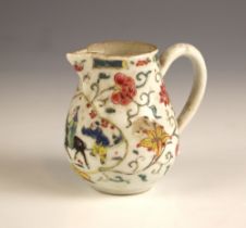 A Chinese porcelain Straits market famille rose sparrow beak jug, 19th century, of bell form