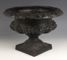 A Victorian style painted cast iron garden planter or urn, 20th century, of squat campana form on