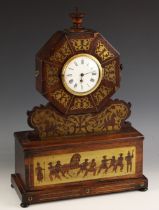 A rosewood and brass inlaid mantel timepiece, mid 19th century, the octagonal case with applied ring