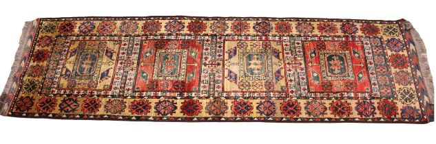 A Qashqai Persian type runner, in red, blue and cream colourways, the four alternating rectangular