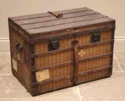 An early Louis Vuitton Rayee canvas steamer trunk, circa 1872-1876, No.8479, the hinged cover