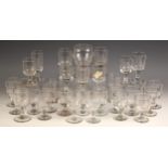 A collection of 18th century and later clear glass, wine glasses and rummers, the tallest 13cm high,