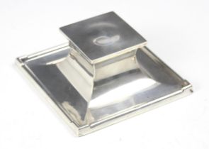 A George V silver inkwell, A & J Zimmerman Ltd, Birmingham 1923, the square shaped hinged cover