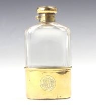 A George V silver gilt hipflask, possibly Percy Whitehouse, London 1913, the hinged cover with