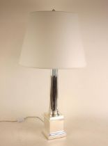 A Ralph Lauren 'blue label' at home Regency column chrome table lamp, of typical fluted form upon an