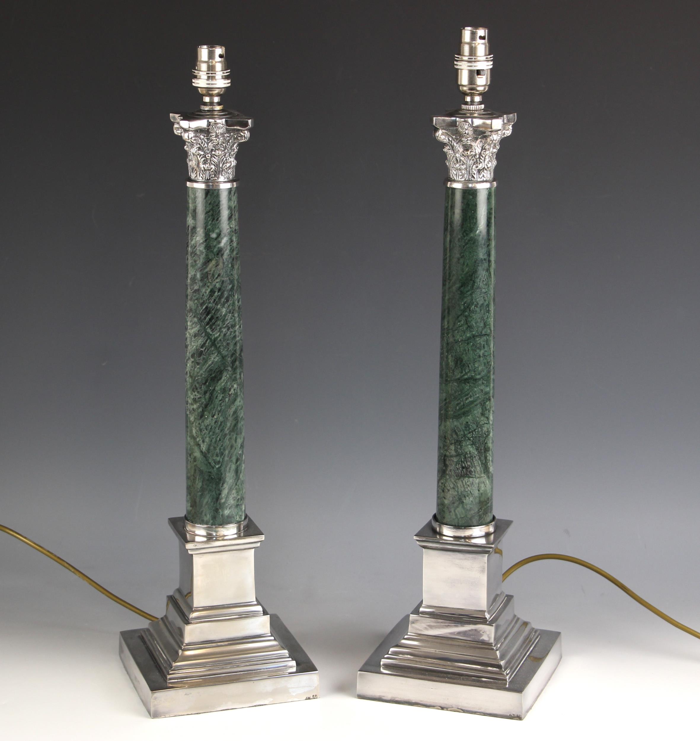 A pair of silver plate mounted green marble table lamps, 20th century, the tapering marble column