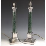 A pair of silver plate mounted green marble table lamps, 20th century, the tapering marble column