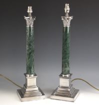 A pair of silver plate mounted green marble table lamps, 20th century, the tapering marble column