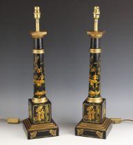 A pair of Japanned lacquered wooden table lamps, 20th century, each modelled as a tapering doric