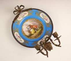 A Sevres porcelain and gilt metal mounted girandole, 19th century, the circular plate centrally