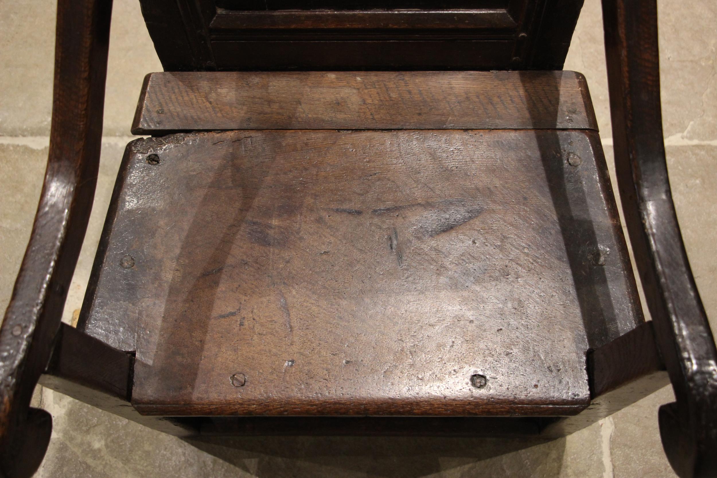 A 17th century oak Lancashire Wainscot chair, the panelled back with a shaped top rail extending - Image 3 of 8