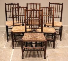 A matched set of six Lancashire spindle back chairs, mid 19th century, each chair with two rows of