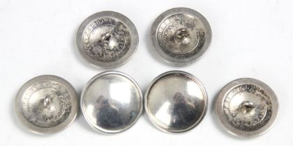 A set of six silver coloured buttons, the circular buttons with plain polished fronts and