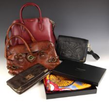 A Ralph Lauren maroon leather handbag, with double top handle and cross body strap, gold tone