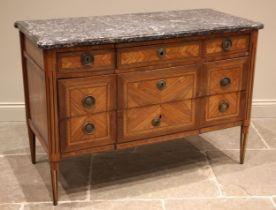 A French Louis XVI style walnut and kingwood marble top commode chest, late 19th century, the