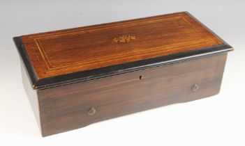 A rosewood cylinder music box, late 19th century, the case with marquetry musical motif and