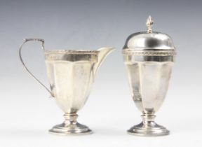A George V silver strawberry set, Elkington and Co, Birmingham 1927-1928, comprising cream jug and
