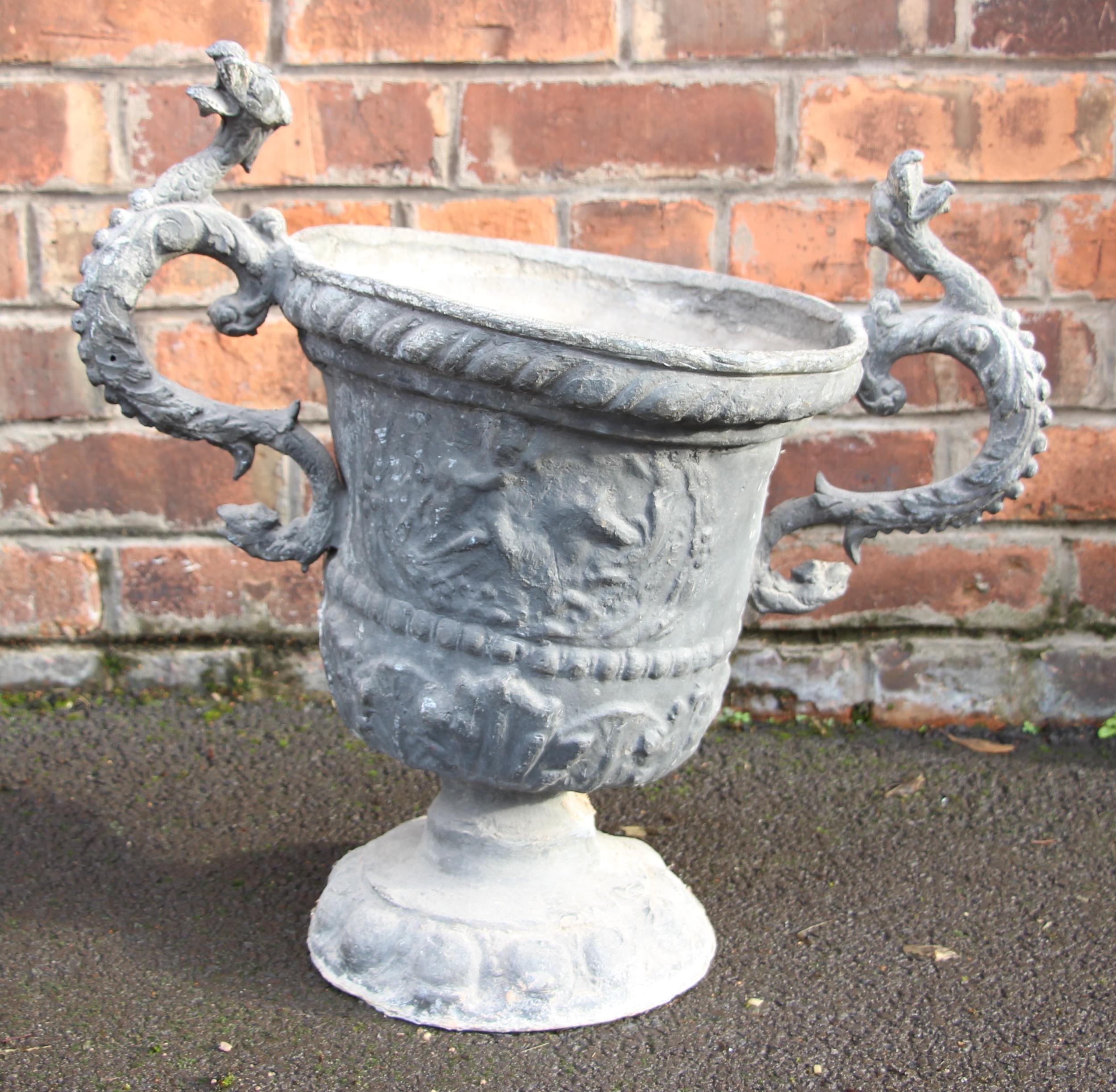 A lead urn planter, 19th century, of twin handled campana form, the body relief moulded with - Image 2 of 2