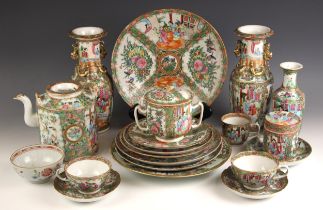 A collection of Chinese Canton porcelain, predominantly 19th century, to include a twin handled