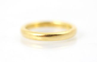 A 22ct yellow gold wedding band, stamped 'ACCo' London 1948, ring size J, 5gms