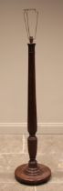 A Regency style mahogany standard lamp, early 20th century, the tapering acanthus moulded column