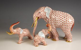 A Herend porcelain elephant of large proportions, 20th century, with red fishnet decoration