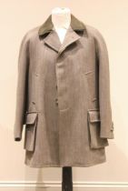 A Cordings shooting jacket, with cartridge pockets, handwarmer pockets, loden collar, with maker's