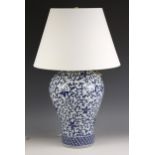A Ralph Lauren blue and white Chinese influence lamp vase, of baluster form, applied with