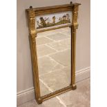 A giltwood and verre eglomise pier mirror, 19th century, the upper frieze depicting a Grecian