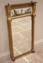 A giltwood and verre eglomise pier mirror, 19th century, the upper frieze depicting a Grecian