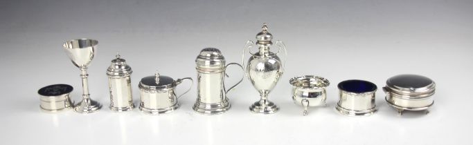 A selection of silver, to include; a silver pepperette in the form of a pounce pot, London 1936 '