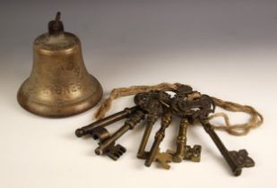 A brass ships bell indistinctly stamped 'Faraday' Widnes', 20cm high, along with a collection of six