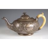 A George III silver teapot, Joseph Craddock and William Ker Reid, London 1813, the cast flowerhead