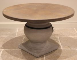 An Oka 'Callanish' stone and resin pedestal patio/conservatory dining table, the circular table