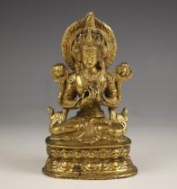 A South East Asian bronze figure of buddha, modelled seated in Padmasana on a lotus crown base