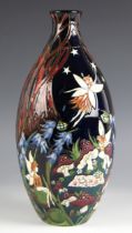 A Moorcroft limited edition vase, in 'The Tea Party' pattern, designed by Nicola Stanley, numbered