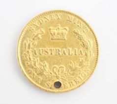 An Australia one sovereign, dated 1867, with drill hole to the top, 8gms