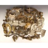 A selection of carved wood and gesso architectural mouldings, to include floral swags and sprays,