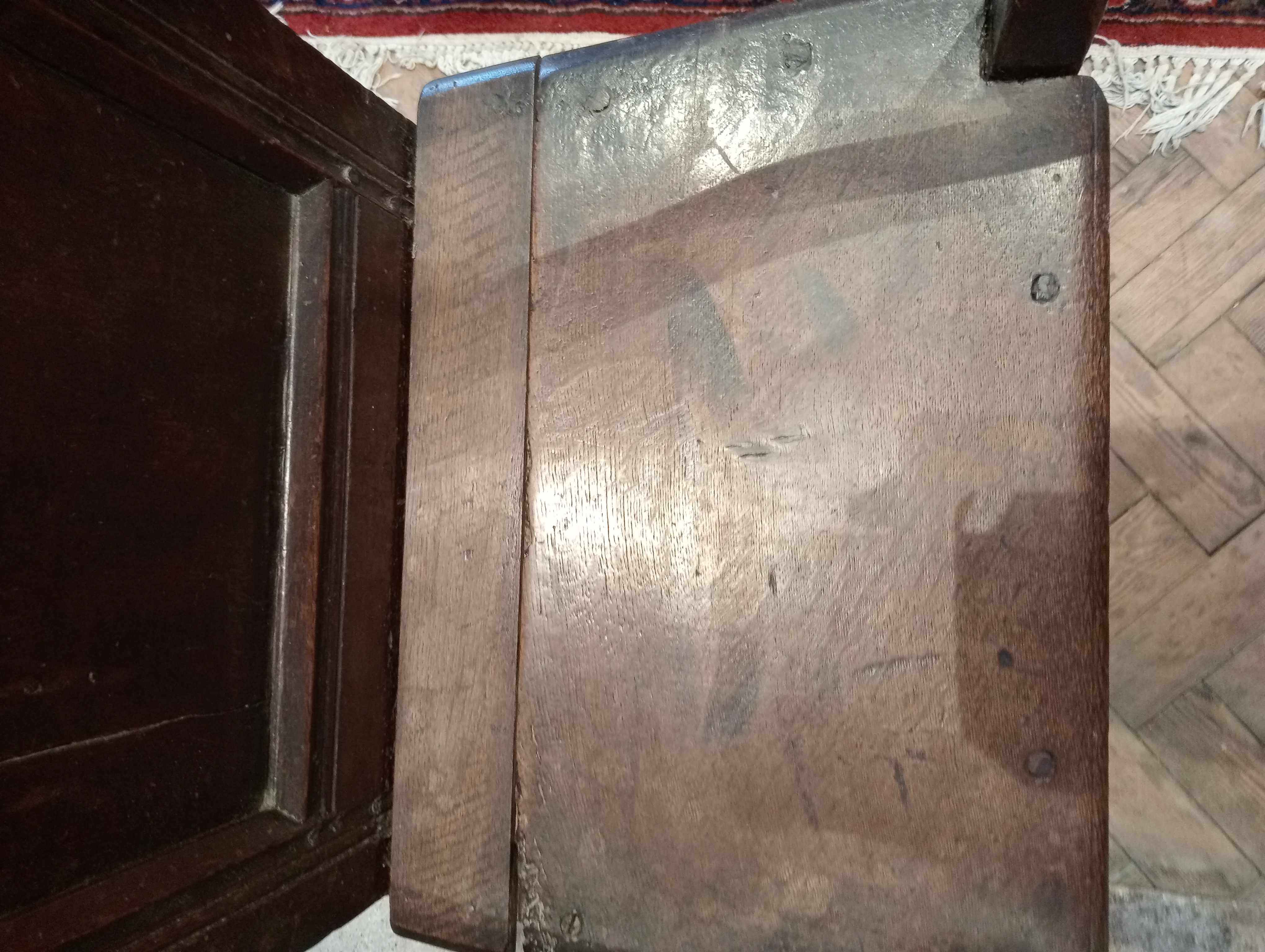 A 17th century oak Lancashire Wainscot chair, the panelled back with a shaped top rail extending - Image 6 of 8