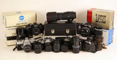 A collection of 35mm camera equipment, to include a boxed Canon F1 SLR camera body, a boxed