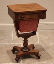 A Victorian walnut work / sewing table, the rectangular top with rounded corners over a single