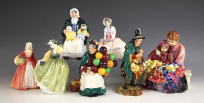 A selection of seven Royal Doulton figures, 20th century and later, comprising: 'The Mask Seller'