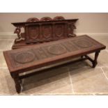 A Nepalese carved hardwood coffee table, late 20th century, the rectangular top with three relief