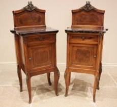 A pair of Louis XV style walnut and marble topped bedside cupboards, early to mid 20th century, each