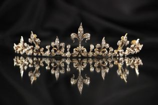 A late 19th/early 20th century diamond set tiara converting to necklace, the central fleur-de-lys